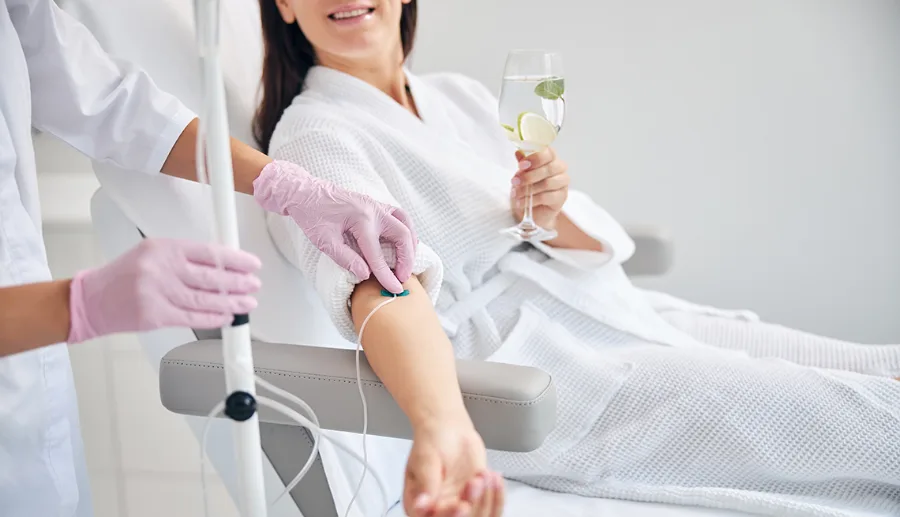 Client receiving an IV vitamin drip at Izba Spa Wimbledon
